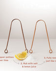 Two copper tongue scraper arches on a white surface with lemon wedges and salt showing usage steps