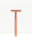 Bambaw Rose gold safety razor on a white background