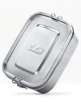 Metallic rectangular bambaw lunch box container with a lid on a white background