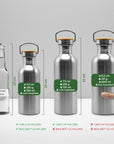 Set of three metal bottles and one glass with dimensions and holder compatibility labels on a gray background
