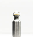 Close up of the insulated water bottle neck with a wooden cap and metal carrying handle.