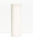 White reusable paper towel roll standing upright against a light background