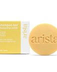 Arista clarifying shampoo bar and packaging on a white background