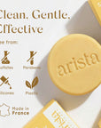 Clarifying Shampoo Bar round yellow disk with Apple Cider Vinegar and Citrus branding