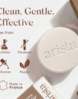 Rice and Ashwagandha strengthening shampoo bar with packaging and eco icons