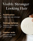 Close up of hair showing two halves with the text Visibly Stronger Looking Hair across the image