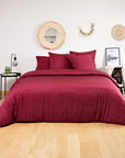 Bed in a pale gray Bamboo Duvet Cover with matching gray pillows in a light modern bedroom