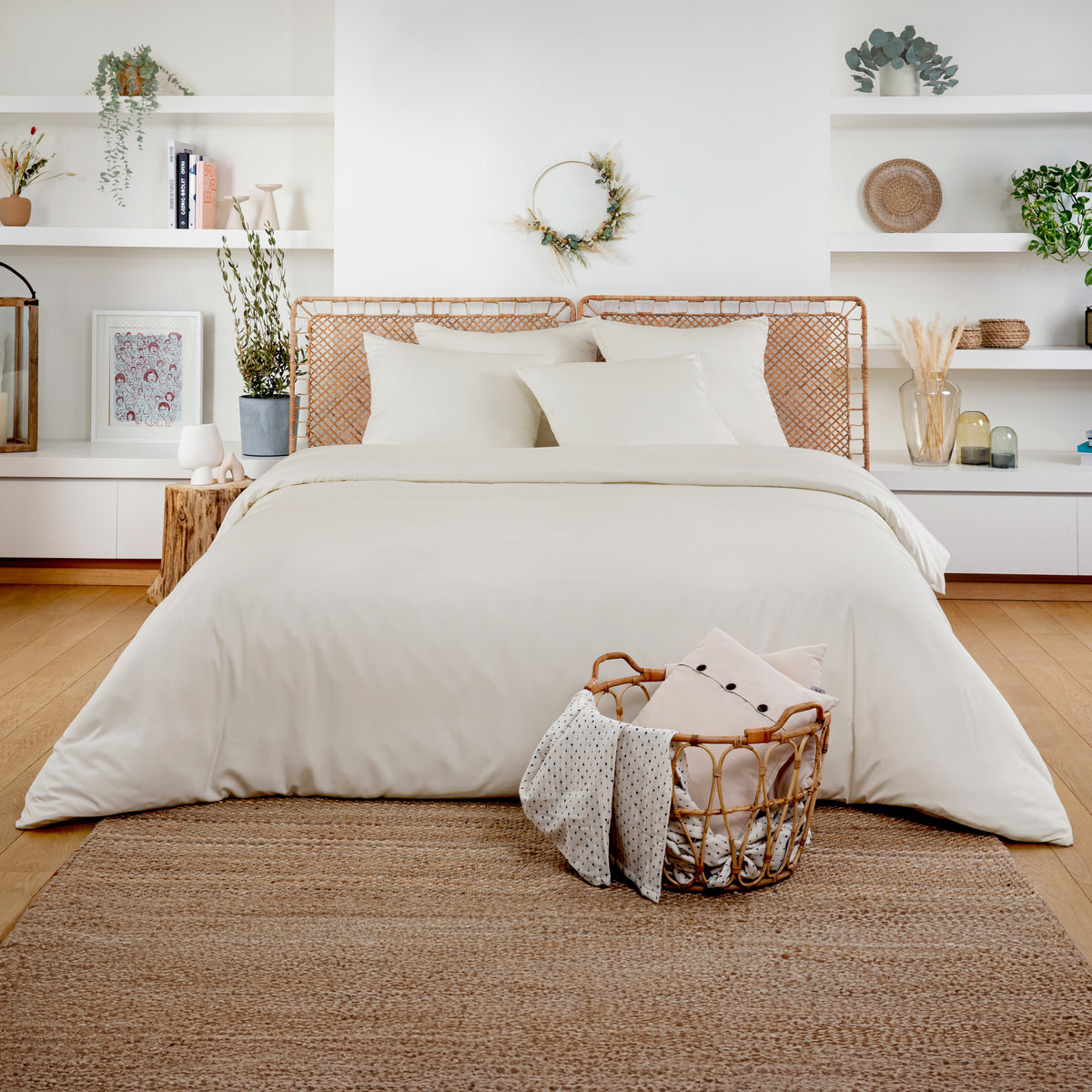 Bed with warm ivory beige Bamboo Duvet Cover and white pillows in a bright minimalist bedroom