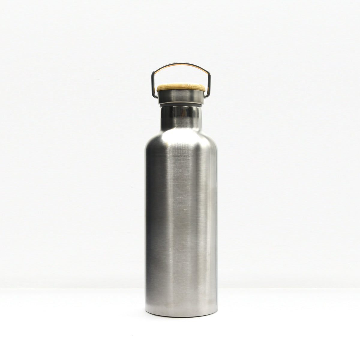 Close up of the bottle neck showing a metal cap and wooden lid with a hoop handle