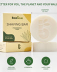 Fragrance free shaving bar packaging shown with a round soap and botanical illustrations