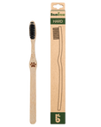 Bambaw bamboo toothbrush with black bristles beside its tall kraft packaging labeled HARD