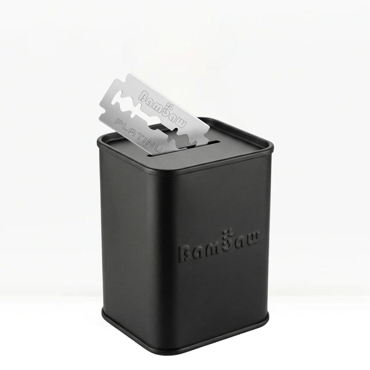 Black metal razor blade holder with blades on a white background