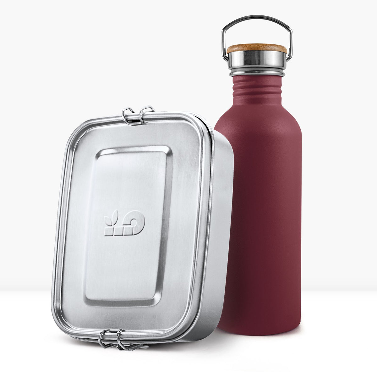Back to School Bundle burgundy non-insulated bottle beside a silver lunchbox with a wooden lid handle