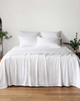 White bambaw cozy bamboo bedding set on a bed with a minimalistic room setting.