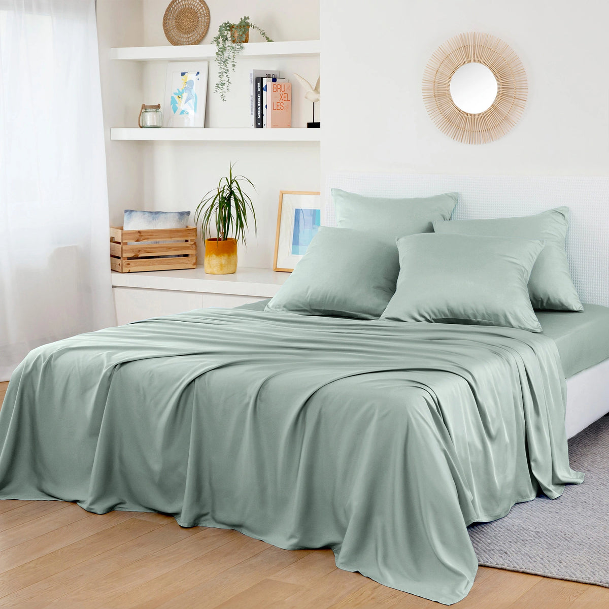 Bed with green bambaw cozy bamboo bedding in a bedroom setting