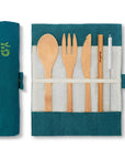 Teal bamboo cutlery set in a fabric roll with spoon fork knife and serrated blade visible