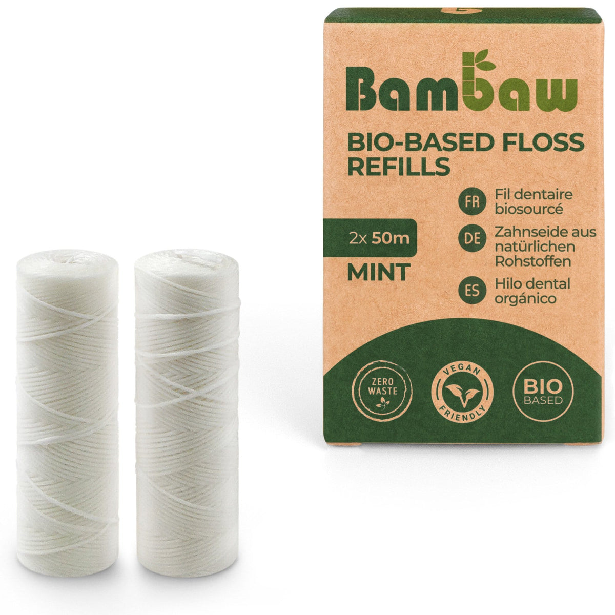 Three white PLA corn starch floss spools beside a tan and green packaging box