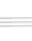 Three cotton straw cleaning brushes with twisted metal stems and looped ends laid in a row