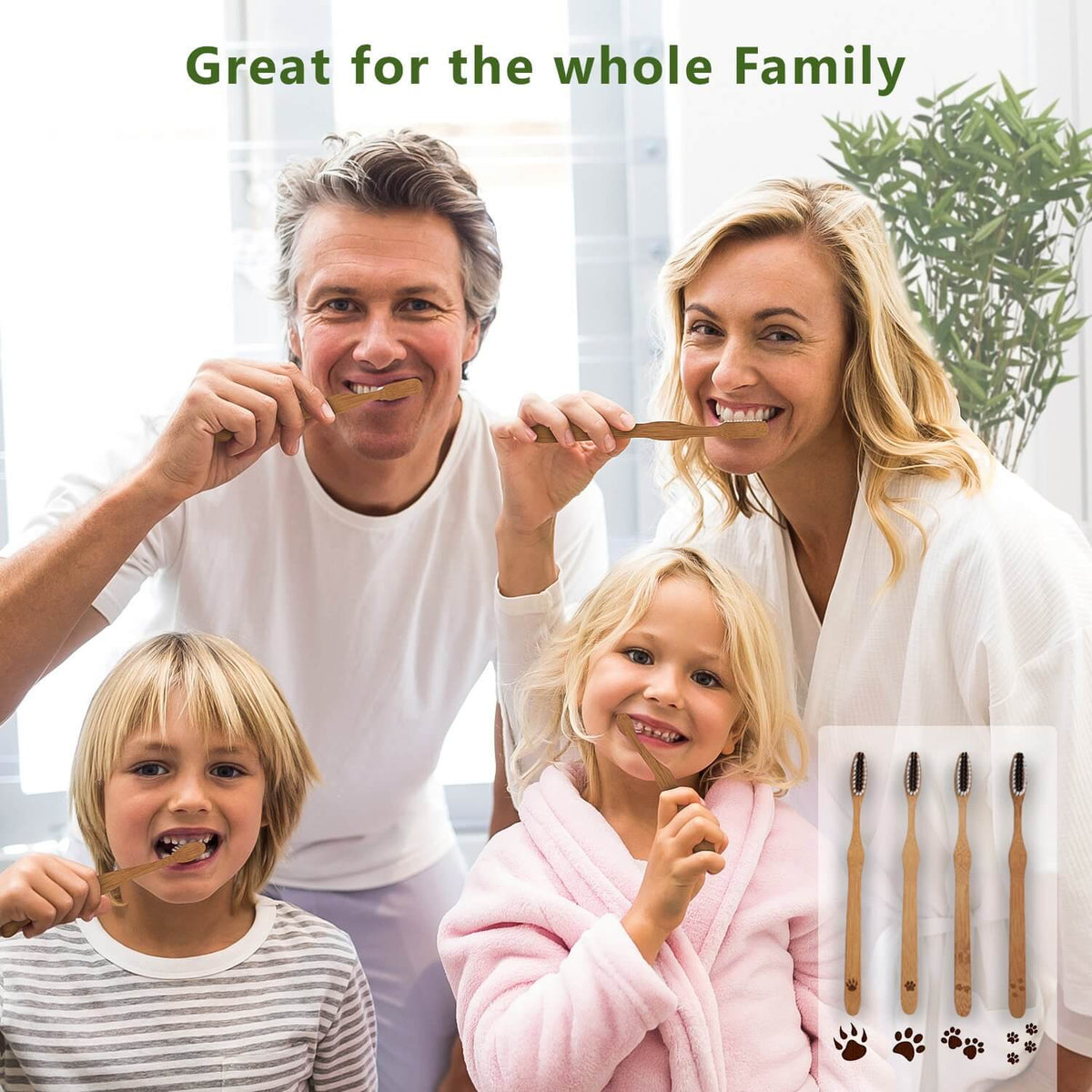 Smiling family of four brushing teeth with bamboo toothbrushes in a bright bathroom