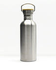 Close up of a non insulated stainless steel water bottle neck with a built in carry handle and visible threading