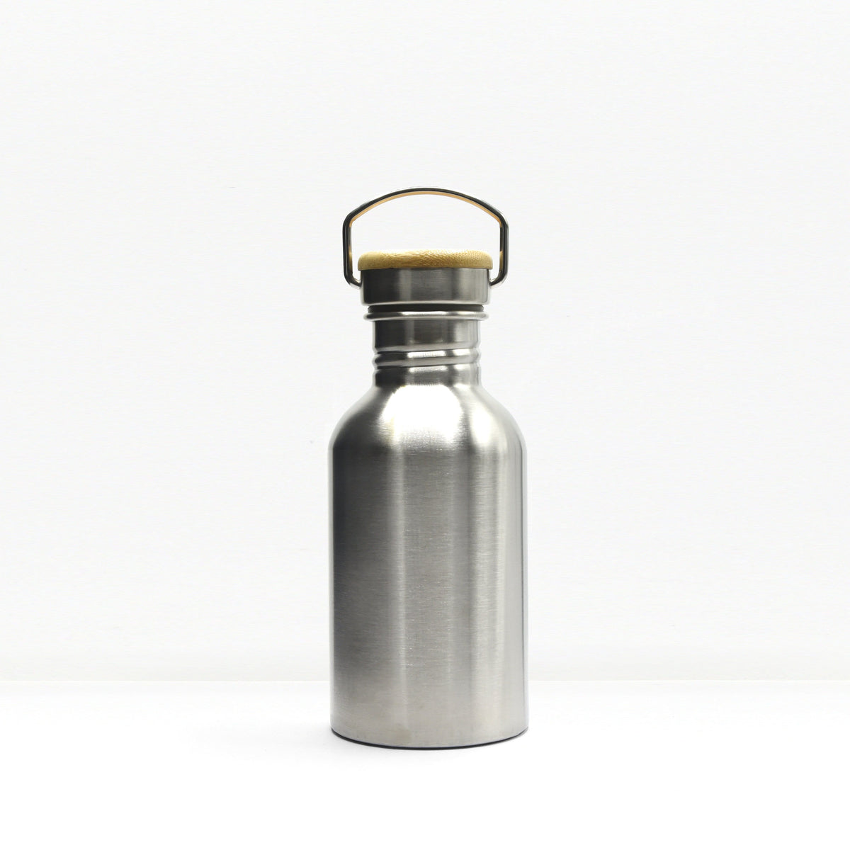 Front view of the stainless steel water bottle neck with a curved handle and tan lid on a white backdrop