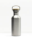 Close up of a stainless steel water bottle neck with a curved wire handle and tan lid against a white background