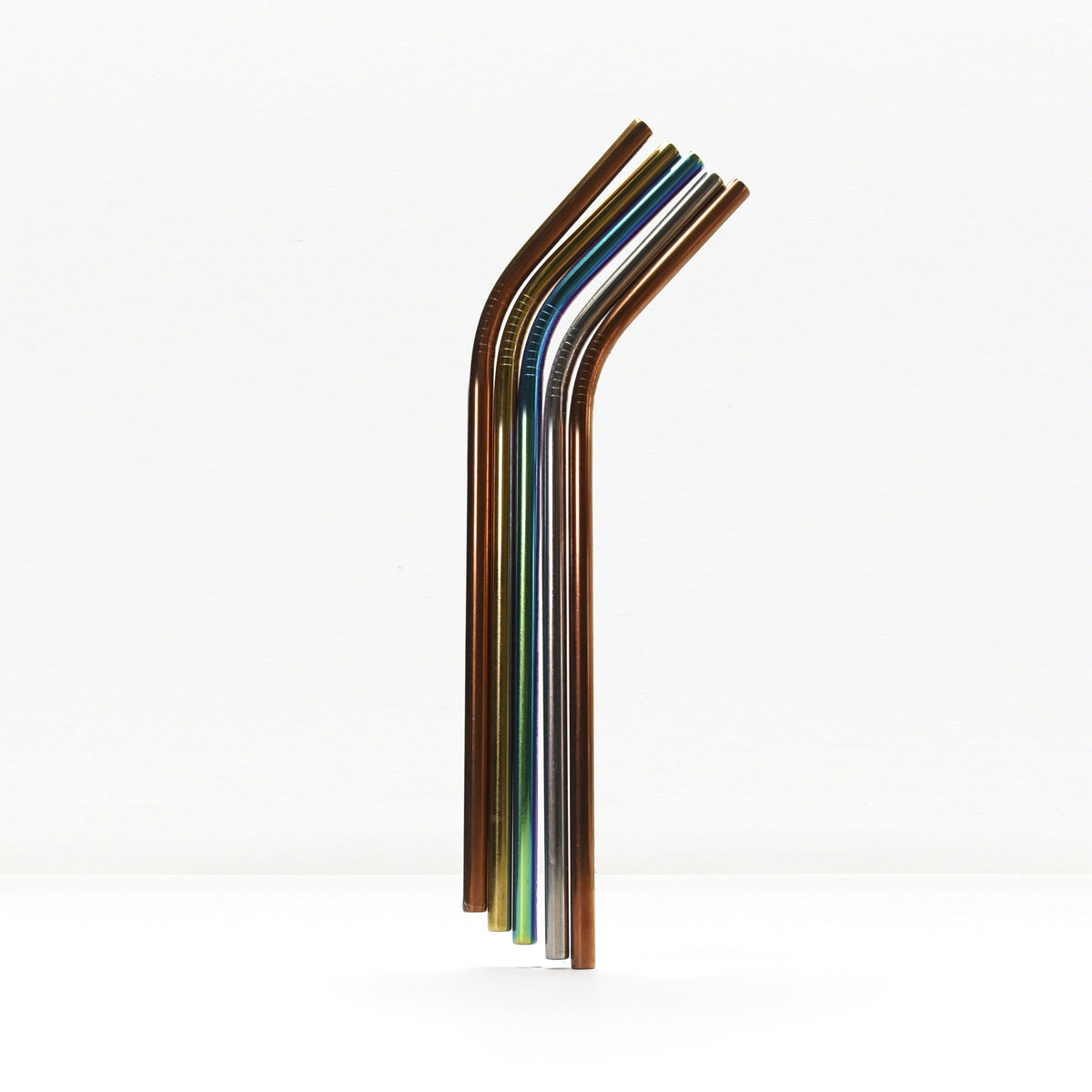 Rainbow metal drinking straws in a glass jar