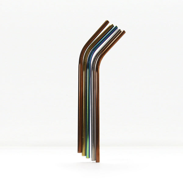 Rainbow metal drinking straws in a glass jar