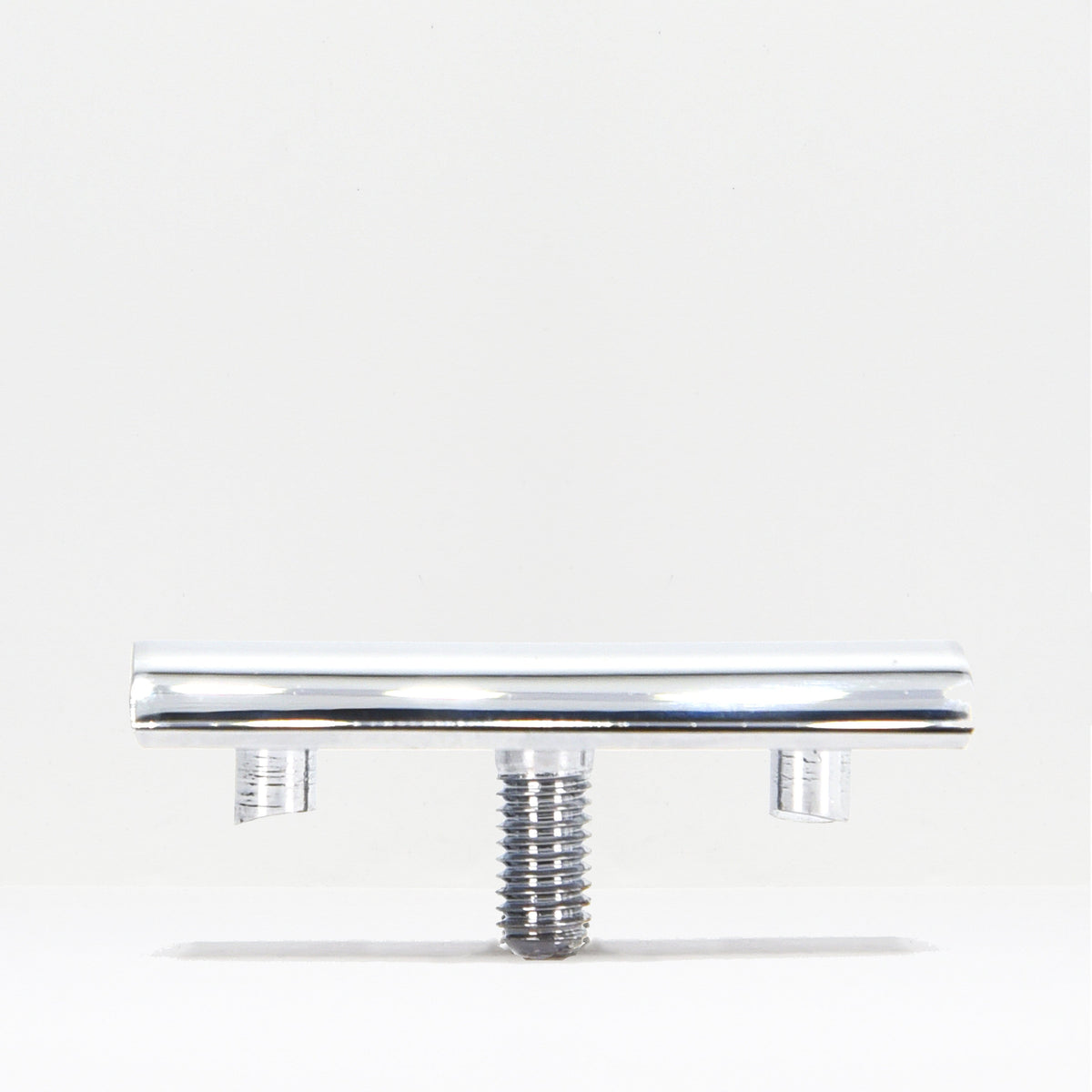 Chrome safety razor head viewed from the front with two mounting prongs and a central threaded stem