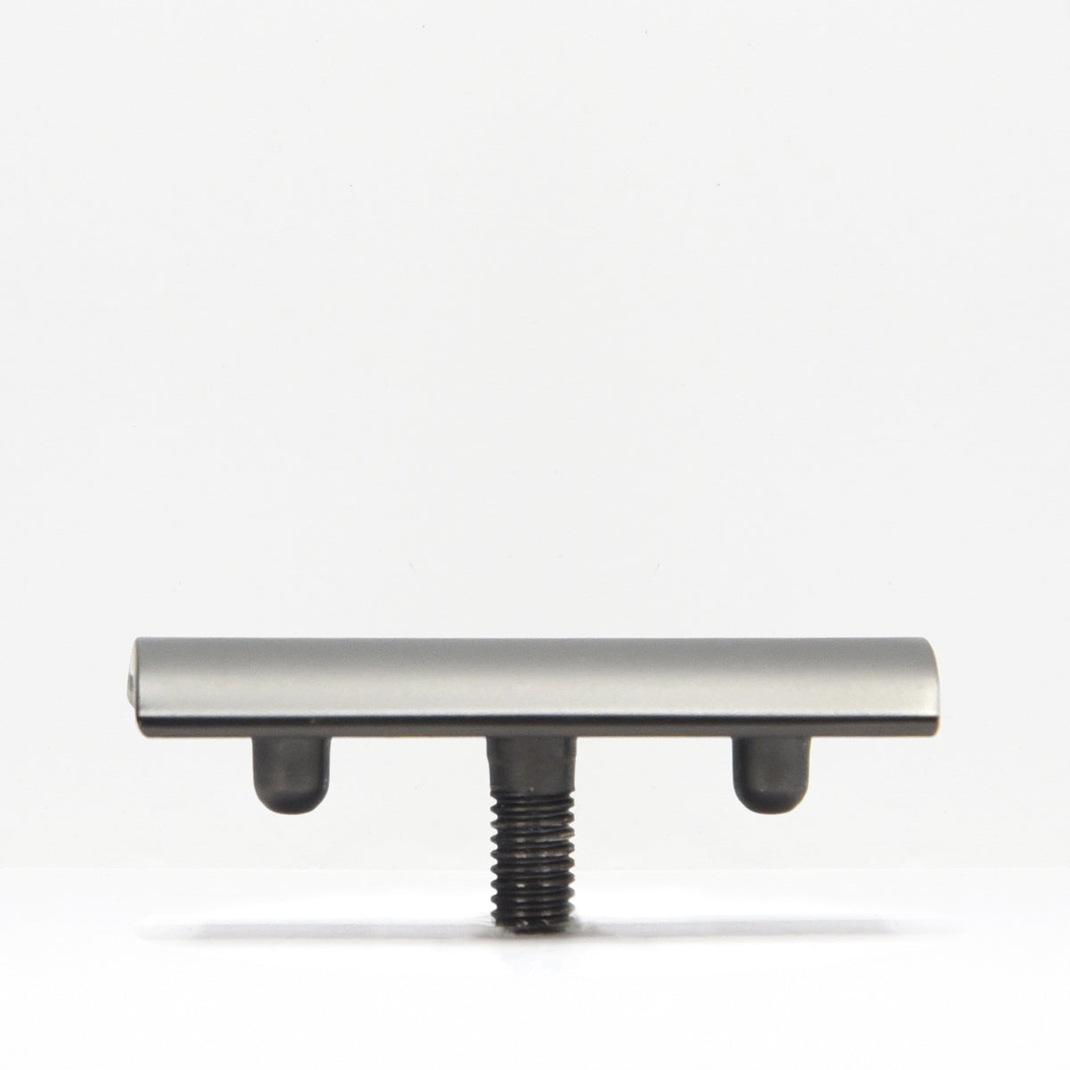 Safety razor head mounted on a threaded post with a silver housing against a white background