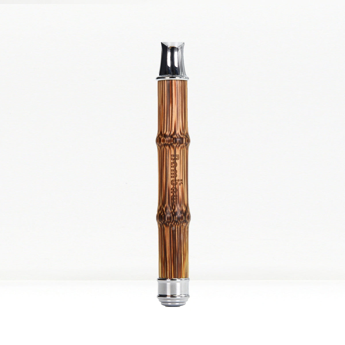 Bamboo safety razor handle with chrome head against a white background