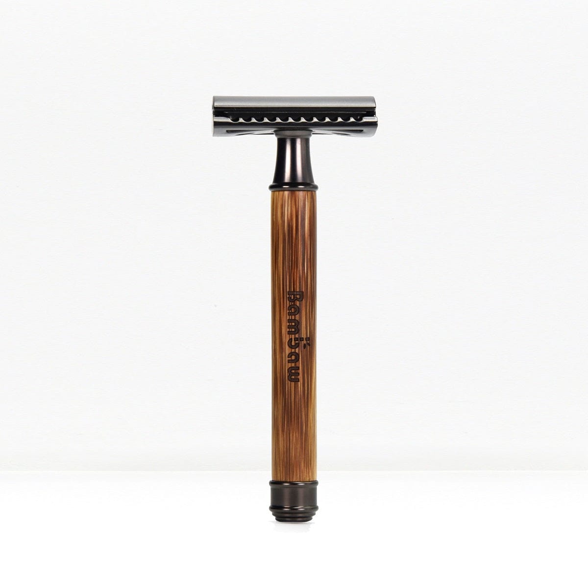 Bamboo safety razor with darker wooden handle and chrome head standing upright on a white background