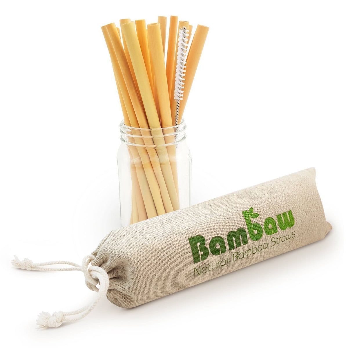 Bamboo drinking straws arranged in a glass jar with a cleaning brush and a beige cloth sleeve